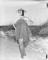 Penny Buzzard wraps herself in a towel at Saint Andrews State Park