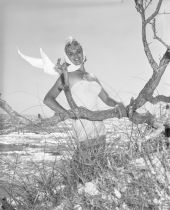 Penny Buzzard poses in a bathing suit at Saint Andrews State Park.