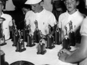 Young golfers look over the trophies at the Pee Wee Golf Tournament - Orlando, Florida