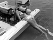 Carol Clough hangs on to the side of the boat - Clearwater, Florida .