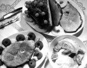 Dishes of ham steak, baked ham, and hamhock with cabbage - Tallahassee, Florida
