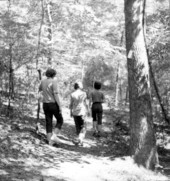 Campers walking on a nature trail in Torreya State Park - Rock Bluff, Florida