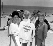 Women from a world wide tour pose for pictures at the beach during Easter vacation - Fort Lauderdale, Florida.