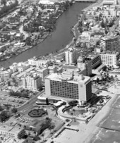 Aerial view with Seville, Sea Isle, Sans Souci, and Saxony Hotels - Miami Beach, Florida.