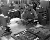 A compositor locks up type for printing at the Lewis paper mill - Jacksonville, Florida.
