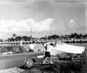 Men launching a motorboat