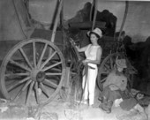 Deane Martin with covered wagon and cowboy mannequin- Silver Springs, Florida.