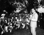 Governor Claude Kirk at FSU with coach Bill "Pete" Peterson and football team - Tallahassee, Florida.