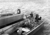 John Wilhelm inspects his fishing lures - Marquesas Keys, Florida