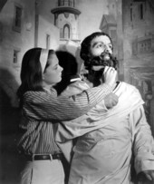A young woman maintaining a bearded figure at Potter's Wax Museum - Saint Augustine, Florida