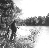 Unidentified man fishing on the Choctawhatchee River