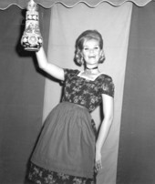 Young woman showing her decorated beer stein at Oktoberfest in Cape Coral - Cape Coral, Florida