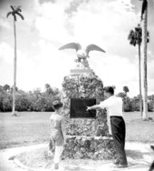 Father and son viewing memorial at the Collier-Seminole State Park - Collier County, Florida.
