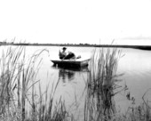 Two men fishing at River Ranch Acres - Polk County, Florida.