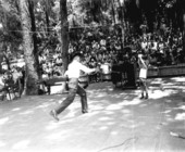 Curly Dekle performs tricks with his whip at the Florida Folk Festival - White Springs, Florida