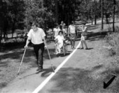 The disabled and other visitors walking at national forest recreation area for the handicapped - Apalachicola National Forest, Florida.