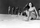 Young woman attempts to ski down the sand - Fort Walton Beach, Florida .