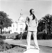 Young woman models the new uniforms for the Welcome Station