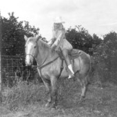 "Miss Sandy Shoes" queen Jan Arnold (later Russell) on horseback at the Sandy Shoes Festival in Ft. Pierce, Florida.