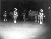 Dancers in cowgirl costumes perform at the Sandy Shoes Festival