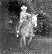 "Miss Sandy Shoes" queen Jan Arnold (later Russell) on horseback at the Sandy Shoes Festival in Ft. Pierce, Florida.