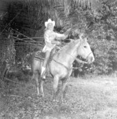"Miss Sandy Shoes" queen Jan Arnold (later Russell) on horseback at the Sandy Shoes Festival in Ft. Pierce, Florida.
