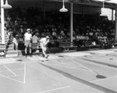 Players at the shuffleboard courts
