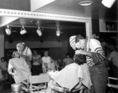 Clowns applying makeup at Circus World