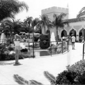 Tourists taking pictures at the entrance to Busch Gardens - Tampa, Florida