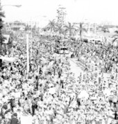 Large crowd gathered for the Gasparilla parade - Tampa, Florida.