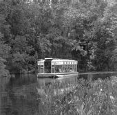 Tourist on boats at Silver Springs - Ocala, Florida .