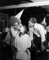 Clown putting makeup on woman - Polk County, Florida