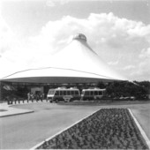 People and buses in front of tent building - Orlando, Florida