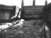 Open flume gate of a small dam at De Leon Springs