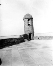 Two girls standing in the San Marcos Tower of the Bastion San Carlos, Castillo de San Marcos