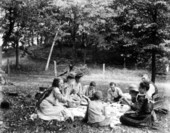Enjoying the food at a picnic
