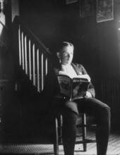 Young man reading Red Book Magazine - Volusia County?, Florida