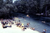 View of visitors enjoying a day at Ichetucknee Springs State Park - Fort White, Florida.