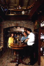 Tourists tasting wine at the Church Street Station in Orlando, Florida.