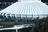 View showing monorail passing by the Space Mountain roller coaster at the Magic Kingdom amusement park in Orlando, Florida.