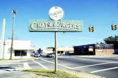 View showing sign for Chat-A-Burgers on the northwest corner of Washington and Bolivar streets in Chattahoochee, Florida.
