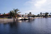 View showing dock next to a waterfront home in Cocoa, Florida.