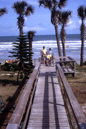Visitors on boardwalk at the Holiday Inn hotel in Cocoa Beach, Florida.