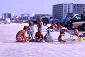 Children making sandcastles at Daytona Beach.