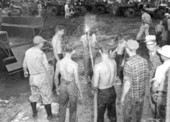 Washing the mud off after the Swamp Buggy Day races - Naples, Florida