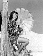 Pat McCarty models a kimono while holding an umbrella - Winter Haven, Florida