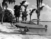 Family with their cabin cruiser