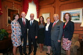 Former governor Charlie Crist and family with Governor Rick Scott during unveiling ceremony of Crist's official portrait in Tallahassee, Florida.