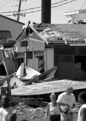 People viewing the damage left by Hurricane Ivan and it's surge - Navarre, Florida.