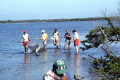 Unidentified people with fishing equipment - Merritt Island, Florida